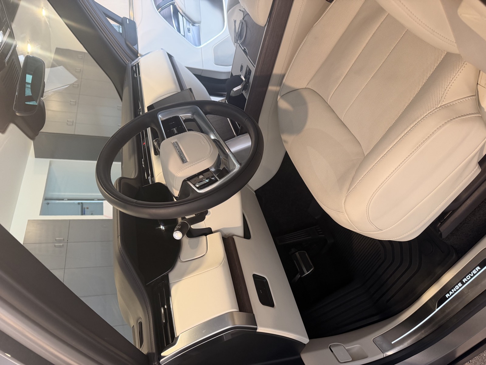 Range Rover interior with clean cream leather seats